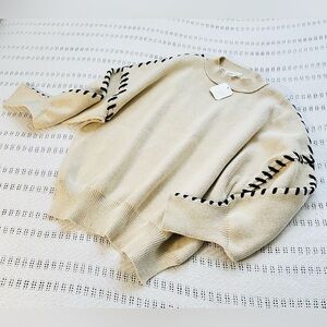 Elegant Cream and black whipstitch Sweater